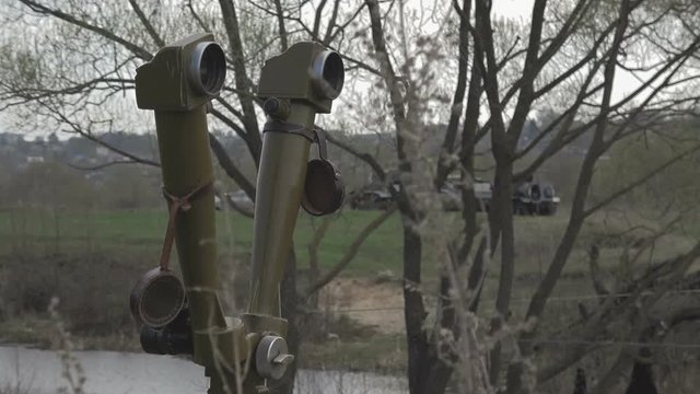 Army optics in the dugout. Military telescope at the funk-hole.
