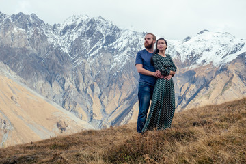 Fototapeta premium couple in love walking in the mountains romantic