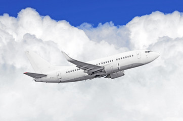 Fototapeta na wymiar Airplane in the sky above the clouds flight journey sun height