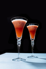 Rossini, a cocktail with Prosecco or champagne and strawberry puree, in a pop contemporary style