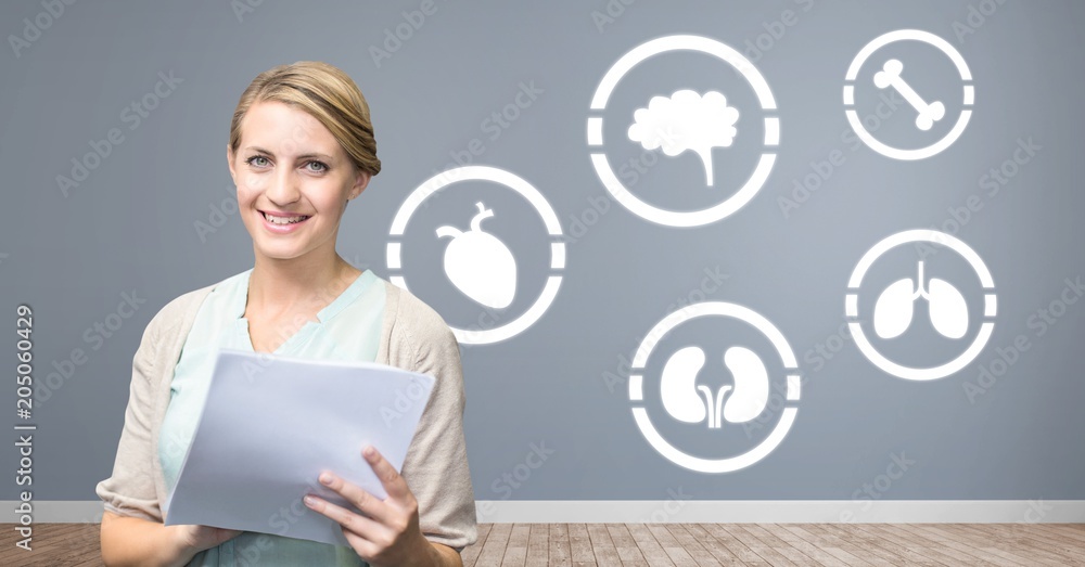 Sticker human body icons on wall and woman holding folders