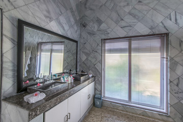 Modern bathroom in grey tone. Contemporary bathroom with gray tiles.
