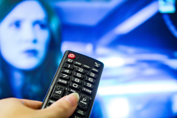 Watching TV and using remote controller