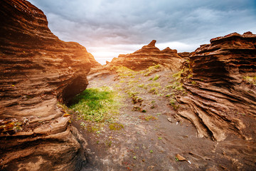 Sandy rocks with by magma formed by winds. Location place Sudurland, Iceland.