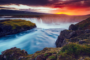 Great rapid flow of water powerful Godafoss cascade. Location place Skjalfandafljot river, Iceland.