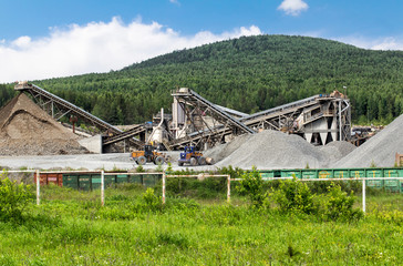 Open pit mining and processing plant for crushed stone, sand and gravel to be used in the roads and...