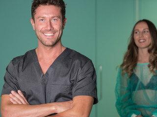 Young surgeon in operatory room.