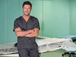 Young surgeon in operatory room.