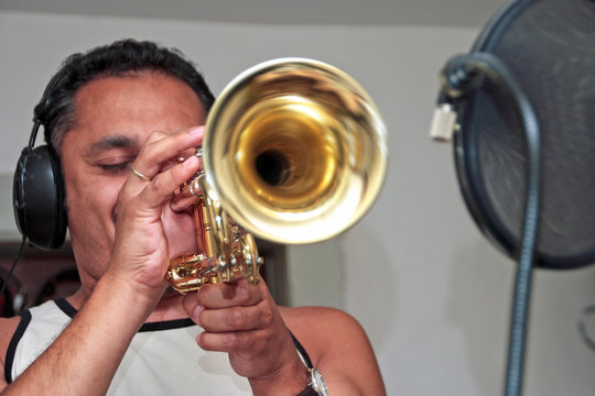 Profession trumpet player in the studio