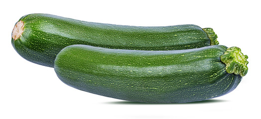 Fresh green zucchin with leaf and flower isolated on white background with clipping path
