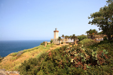 Fototapeta na wymiar Cape Spartel - light house - at the horizon the Spanish coast