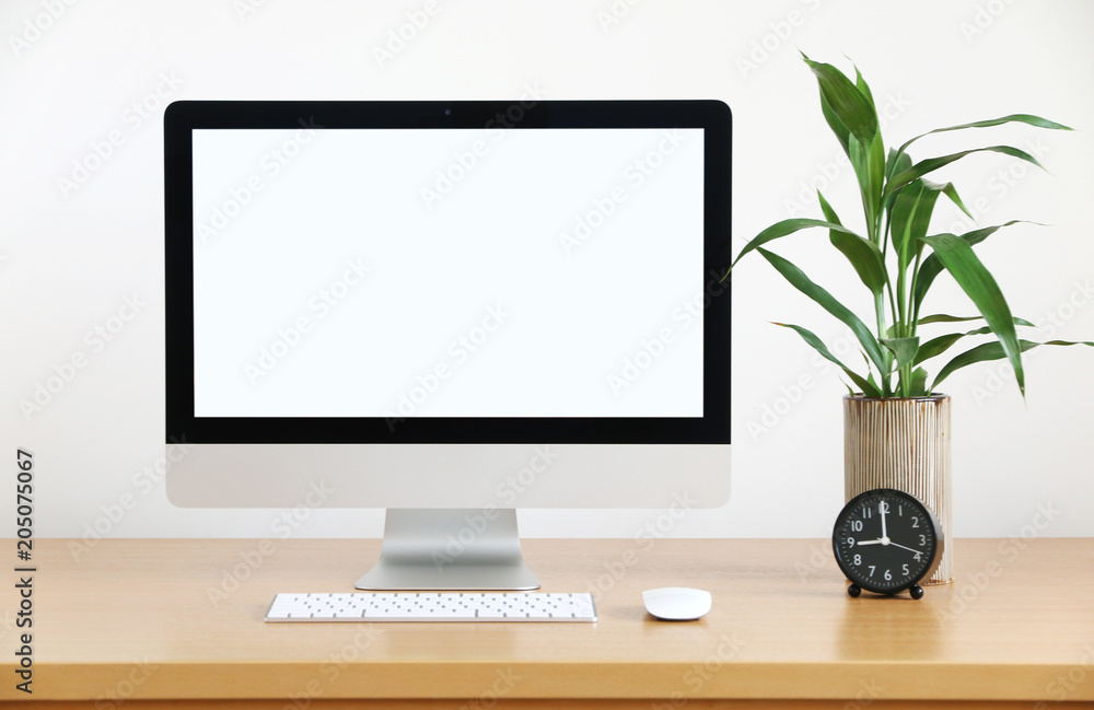 Poster mock up front view blank screen computer all in one with mouse, keyboard,pencils and tree vase in mo