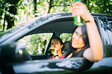 Drinking beer in car