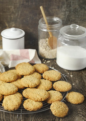 Homemade oatmeal cookies on wooden table.