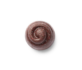 Delicious chocolate candy on white background, top view