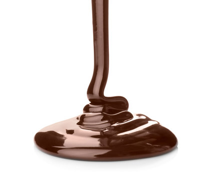 Pouring delicious melted chocolate on white background