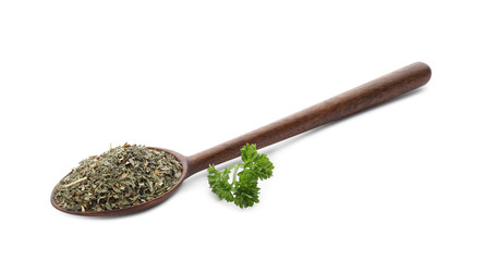 Wooden spoon with dried parsley on white background