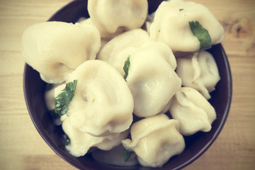 Appetizing traditional Russian dumplings with meat close-up