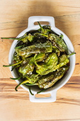 Pimientos de Padron. Padron Green Peppers in White Bowl.