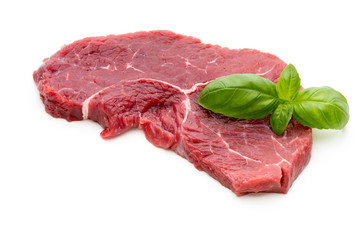 Fresh raw beef steak isolated on white.