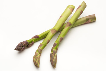 Fresh green asparagus on white background.