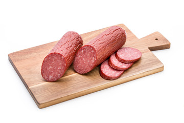 Salami smoked sausage, basil leaves on white background cutout.