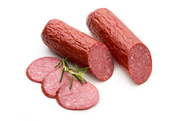 Salami smoked sausage, basil leaves on white background cutout.