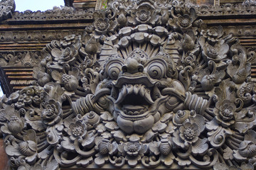 Fototapeta na wymiar Balinese stone sculpure. Royal Palace decoration