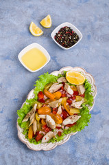 Fish fillet with raw vegetables