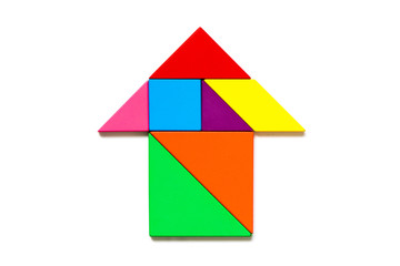 Color wood tangram puzzle in arrow or home shape on white background