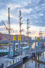 View on brick houses, sailboats and river 