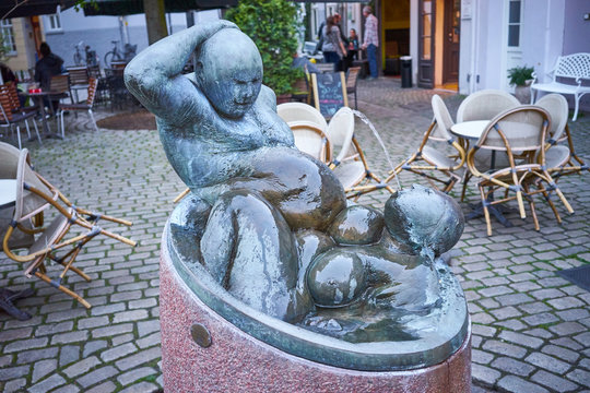 Fountain "The happy bathers" in District "Schnoor" in Bremen - Germany / Sculpture of Jürgen Cominotto