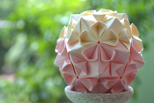 Modular origami, cherry blossom, on natural background