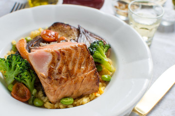 Grilled Salmon Steak with Vegetables on White Plate. Healthy Food.