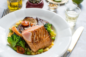 Grilled Salmon Steak with Vegetables on White Plate. Healthy Food.