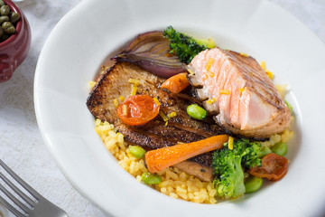 Grilled Salmon Steak with Vegetables on White Plate. Healthy Food.