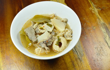 boiled spicy pork entrails in Tom Yum soup on bowl