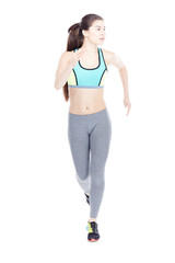 Isolated full length portrait of fit girl running or jogging 