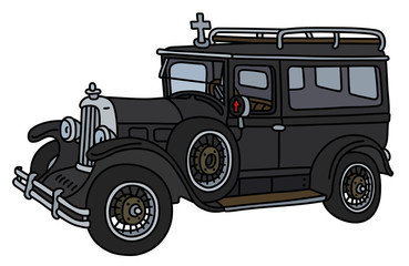 The vintage black funeral car