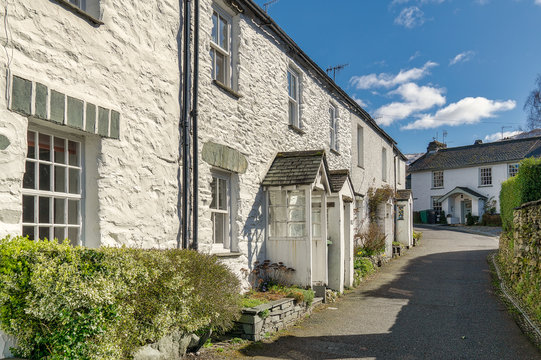A row of whitewashed cottages in Ambleside, the English Lake Dis