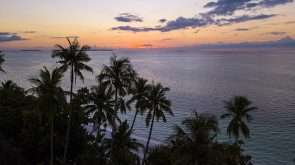 Fototapeta na wymiar Sunset over tropical beach