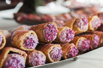 Waffles with pink buttercream, closeup