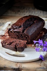 Freshly baked chocolate cake on the kitchen table
