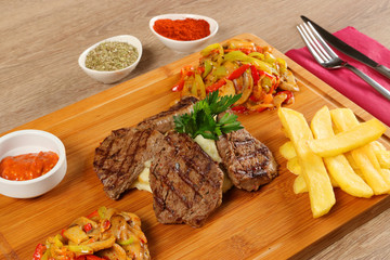 Delicious Beef Steak Meat on Wooden Restaurant Plate