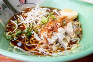 Crispy Pork noodles with egg in big bowl