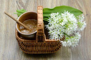 wild garlic mustard in a basket with flesh leaves and flower heads of ramson © lcrms