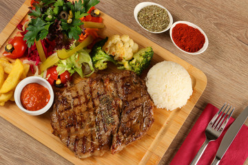 Delicious Beef Steak Meat on Wooden Restaurant Plate