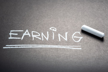 Fototapeta premium Earning Topic