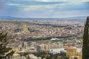 Fototapeta na wymiar TBILISI, GEORGIA - APRIL 3, 2018: Panoramic view of Tbilisi town