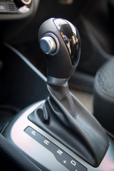 Automatic gear stick of modern car. Interior of car close up